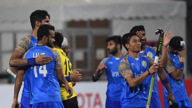 India's team members celebrate after winning the match against Pakistan during the men's field hockey bronze medal match between India and Pakistan at the 2018 Asian Games in Jakarta.(AFP)