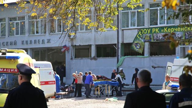 Rescuers carry an injured victim of a blast at at a college in the city of Kerch on October 17, 2018. - Thirteen people were killed and 50 more wounded, most of them teenagers, after a blast tore into a college canteen in Russian-annexed Crimea in what Moscow called a "terrorist" attack. (AFP) Rescuers carry an injured victim of a blast at at a college in the city of Kerch on October 17, 2018. - Thirteen people were killed and 50 more wounded, most of them teenagers, after a blast tore into a college canteen in Russian-annexed Crimea in what Moscow called a "terrorist" attack. (AFP)
