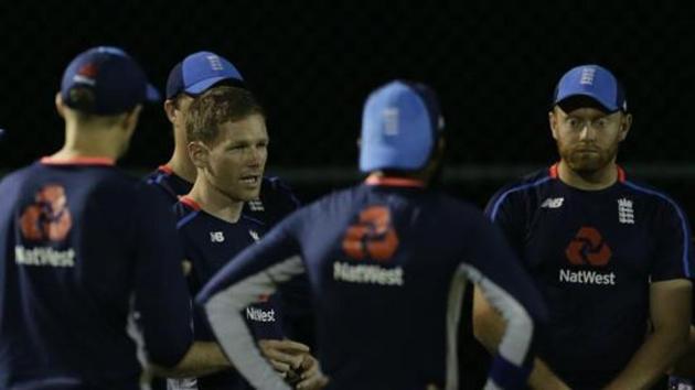 England's Eoin Morgan, second left, speaks to his players during a practice session with his team mates.(AP)