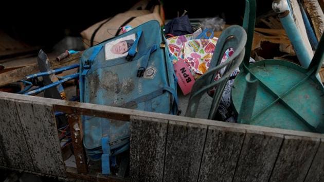 Belongings are seen among rubble. Others must reconcile themselves to the loss of loved ones. In Petobo, about 12 km away, Ameriyah, 56, lost three of her children, a grandchild and a son-in-law. She has accepted it is unlikely that searchers will now uncover their remains. “We’ve held funeral prayers for them, so we hope their souls will be at peace,” she said. (Jorge Silva / REUTERS)