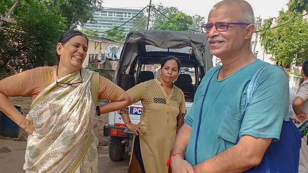 Human rights advocate Sudha Bharadwaj (left) after she was arrested by the Pune police in connection with the Bhima Koregaon violence, in Faridabad on August 28, 2018.(PTI)