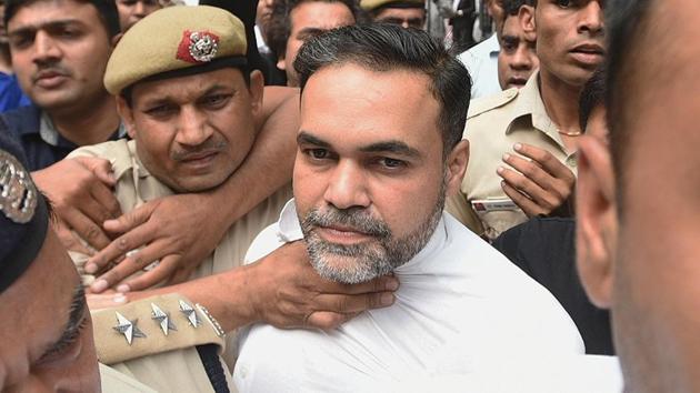 Ashish Pandey leaves Patiala House court after being remanded to one-day police custody in New Delhi. (Sonu Mehta/HT Photo) Ashish Pandey leaves Patiala House court after being remanded to one-day police custody in New Delhi. (Sonu Mehta/HT Photo)
