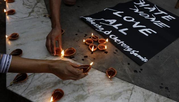 A protest against the brutal killing of a Muslim labourer in the Indian western Rajasthan state Wednesday in Kolkata, December 8, 2017(AP) A protest against the brutal killing of a Muslim labourer in the Indian western Rajasthan state Wednesday in Kolkata, December 8, 2017(AP)