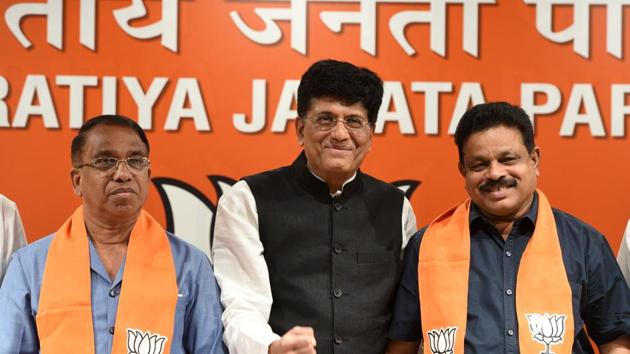 Congress sitting MLA's from Goa Subhash Shirodhkar (L) and Dayanad Satope (R) join Bhartiya Janata Party in presence of Union minister Piyush Goyal (C) at BJP head quarter in New Delhi on October 16. (Mohd Zakir/HT PHOTO) Congress sitting MLA's from Goa Subhash Shirodhkar (L) and Dayanad Satope (R) join Bhartiya Janata Party in presence of Union minister Piyush Goyal (C) at BJP head quarter in New Delhi on October 16. (Mohd Zakir/HT PHOTO)