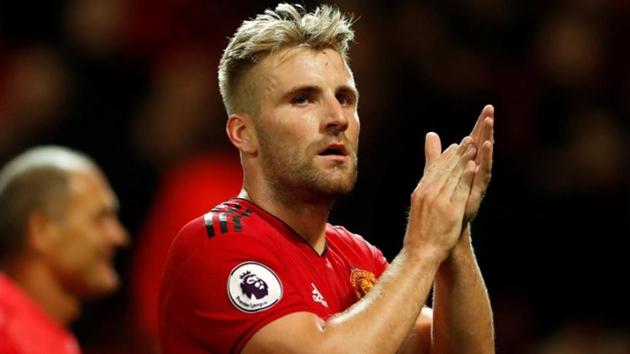 Manchester United's Luke Shaw applauds fans after the match.(Action Images via Reuters)