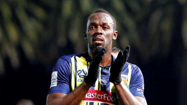 Central Coast Mariners' Usain Bolt applauds the fans after the match(REUTERS)