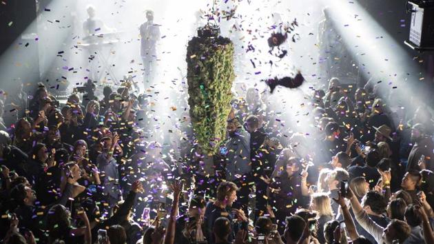 A depiction of a cannabis bud drops from the ceiling at Leafly’s countdown party in Toronto, on the eve of the first day legalization of Cannabis across Canada. (Chris Young / The Canadian Press via AP)