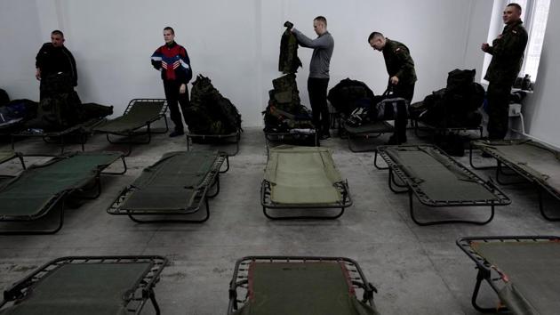 Recruits prepare their accommodation on their first day of 16-day basic training. Most Poles perceive their main threat to be from Russia, which has built up significant conventional forces along its western borders after annexing Crimea from Ukraine in 2014. Opinion polls show that since then, nearly half the people in Poland feel their independence may be under threat. (Kacper Pempel / REUTERS)
