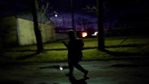 A recruit marches toward breakfast meal after morning exercises. Wierzbicki said that by joining WOT he is following in the family tradition set by his grandfathers of defending Poland. “Poland will be safer now and in the future,” he said. (Kacper Pempel / REUTERS)