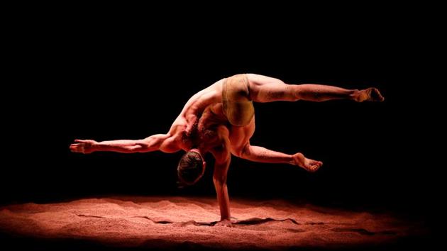 An artist from the dance company Recirquel performs during the dress rehearsal for ‘My Land’ in Budapest, Hungary. (Bernadett Szabo / REUTERS)