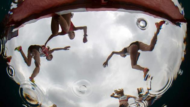 Athletes compete in the Athletics Womens 3000m Stage 1 at The Athletics Field, Youth Olympic Park during the Youth Olympic Games (YOG) in Buenos Aires, Argentina. (Joel Marklund / OIS / IOC / AFP)