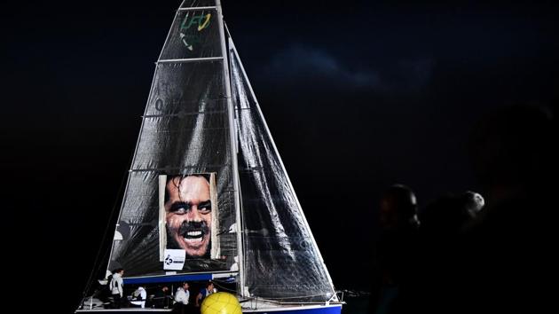 Participants compete during night event “Barcolana UFO 28” category as part of the 50th Barcolana Regatta in the Gulf of Trieste, Italy. With some 2,500 vessels, the Barcolana gathers the most participants of any sailing regatta in the world. (Vincenzo Pinto / AFP)