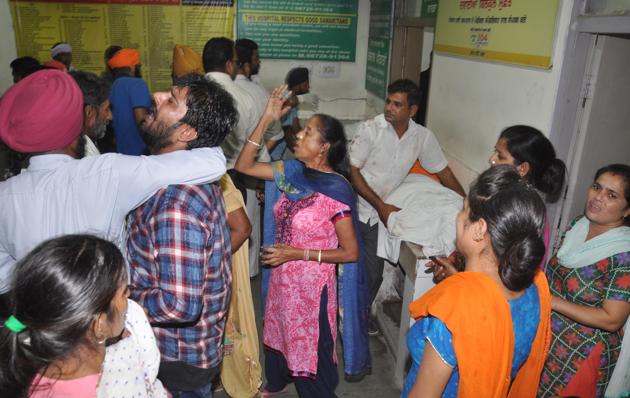 Relatives of victims after a train accident at Civil Hospital in Amritsar, India, on Friday, October 19, 2018.(Sameer Sehgal/Hindustan Times)