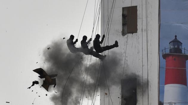 National Security Guard (NSG) commandos showcase their abilities during a function to celebrate the 34th NSG Raising Day, at their Manesar campus in Gurugram, Haryana. (Sanjeev Verma / HT Photo) National Security Guard (NSG) commandos showcase their abilities during a function to celebrate the 34th NSG Raising Day, at their Manesar campus in Gurugram, Haryana. (Sanjeev Verma / HT Photo)