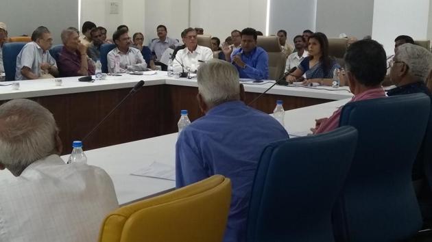 Collector Naval Kishore Ram (in blue shirt) and deputy election officer Monika Singh Thakur (in sari) address representatives of housing societies in the city on Friday. (HT PHOTO) Collector Naval Kishore Ram (in blue shirt) and deputy election officer Monika Singh Thakur (in sari) address representatives of housing societies in the city on Friday. (HT PHOTO)
