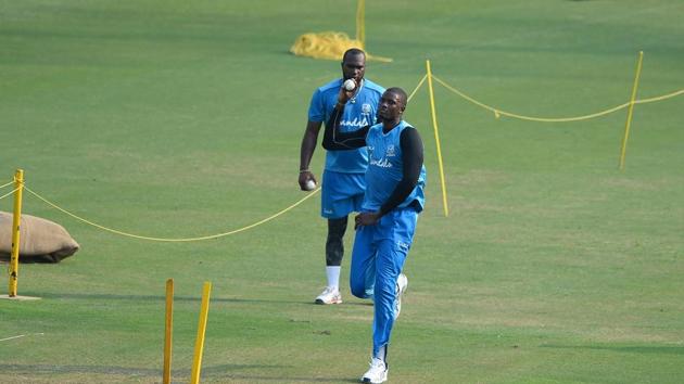 West Indies cricket captain Jason Holder (R) bowls during a training session ahead of the first one day international (ODI) cricket match between West Indies and India at Barsapara Cricket Stadium in Guwahati. (AFP) West Indies cricket captain Jason Holder (R) bowls during a training session ahead of the first one day international (ODI) cricket match between West Indies and India at Barsapara Cricket Stadium in Guwahati. (AFP)