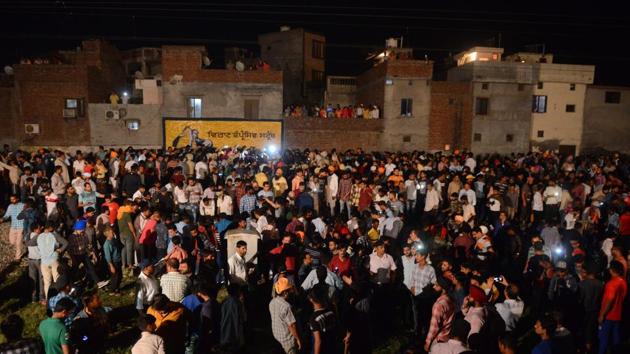 A train crashed into people watching Dussehra in Amritsar, killing at least 60 people.(AFP)