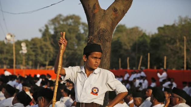 A young member of the Rashtriya Swayamsevak Sangh (RSS), a hard-line Hindu group attends Vijay Dashmi celebrations in Allahabad, Uttar Pradesh. (Rajesh Kumar Singh / AP) A young member of the Rashtriya Swayamsevak Sangh (RSS), a hard-line Hindu group attends Vijay Dashmi celebrations in Allahabad, Uttar Pradesh. (Rajesh Kumar Singh / AP)