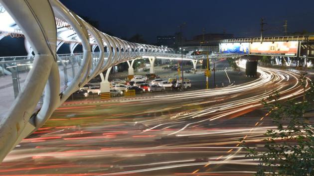 A long exposure photograph of traffic moving to and fro near the newly opened Skywalk at ITO in New Delhi, India. (Raj K Raj / HT Photo) A long exposure photograph of traffic moving to and fro near the newly opened Skywalk at ITO in New Delhi, India. (Raj K Raj / HT Photo)