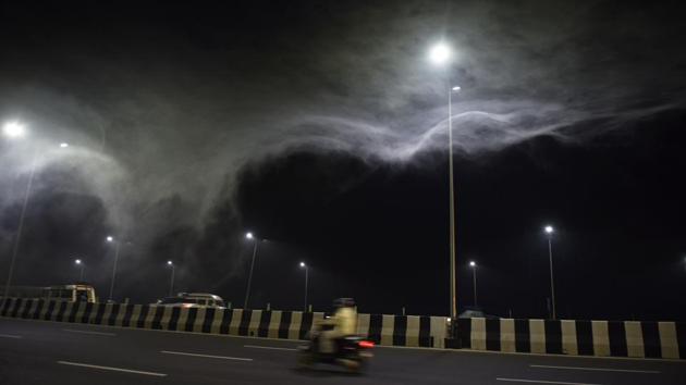 Waves of smoke run across the Delhi-Meerut Expressway (NH24) near Commonwealth games village, due to the burning of dry leaves and grass as a fumigant near the river Yamuna, in New Delhi. (Mohd Zakir / HT Photo) Waves of smoke run across the Delhi-Meerut Expressway (NH24) near Commonwealth games village, due to the burning of dry leaves and grass as a fumigant near the river Yamuna, in New Delhi. (Mohd Zakir / HT Photo)