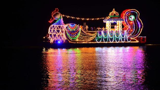 Sri Durga Malleswara Swami Varla Devasthanam’s illuminated Hamsavahanam runs across Krishna river on the occasion of Vijayadasami in Vijayawada, Andhra Pradesh. (PTI) Sri Durga Malleswara Swami Varla Devasthanam’s illuminated Hamsavahanam runs across Krishna river on the occasion of Vijayadasami in Vijayawada, Andhra Pradesh. (PTI)