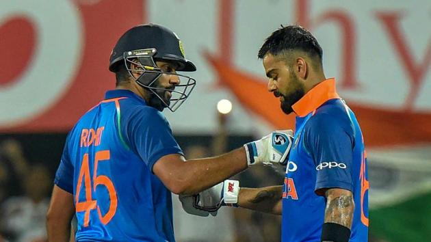 Indian cricket team Captain Virat Kohli celebrates his century with teammate Rohit Sharma during the first One Day International cricket match against West Indies. (PTI) Indian cricket team Captain Virat Kohli celebrates his century with teammate Rohit Sharma during the first One Day International cricket match against West Indies. (PTI)