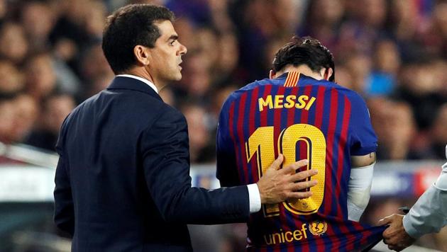 Lionel Messi receives medical attention after sustaining an injury. (REUTERS) Lionel Messi receives medical attention after sustaining an injury. (REUTERS)