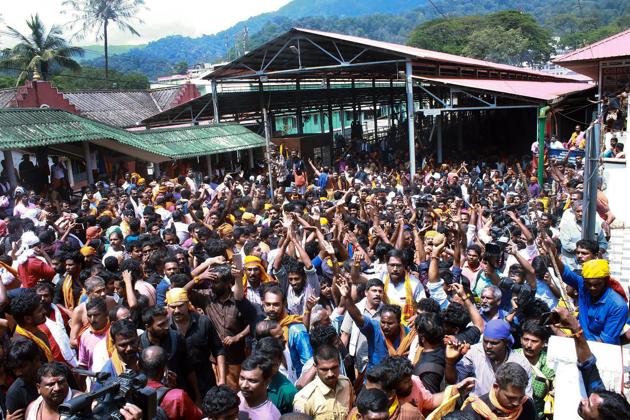 Protesters chant slogans as several female devotees arrive to offer prayers at Sabarimala temple in light of the recent verdict by Supreme Court allowing entry to women of all ages in the temple.(PTI) Protesters chant slogans as several female devotees arrive to offer prayers at Sabarimala temple in light of the recent verdict by Supreme Court allowing entry to women of all ages in the temple.(PTI)
