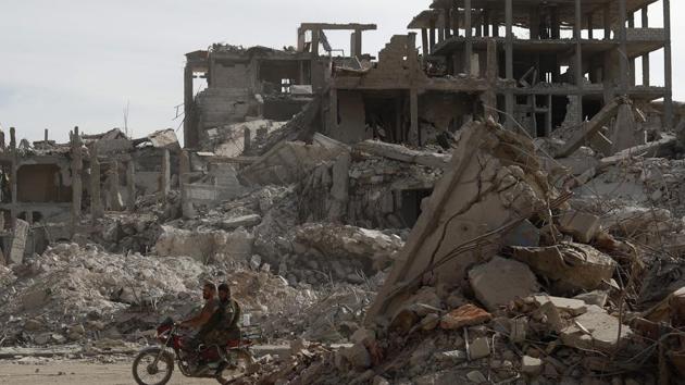 Syrian Soldiers ride a scooter through a devastated part of Yarmouk in the Syrian capital Damascus, Syria, October 6, 2018. Syria is one of the places from where Indians have been rescued by the Indian government over the last four years. (AP) Syrian Soldiers ride a scooter through a devastated part of Yarmouk in the Syrian capital Damascus, Syria, October 6, 2018. Syria is one of the places from where Indians have been rescued by the Indian government over the last four years. (AP)