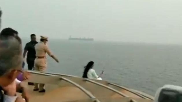 Maharashtra chief minister Devendra Fadnavis’s wife Amruta Fadnavis clicked a selfie on the restricted area of Angriya, India’s first domestic luxury cruise ship, despite being cautioned by the police, news agency ANI reported on Monday.(Videograb from ANI)