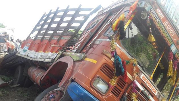 At least five people were killed and 10 to 12 others injured after the private bus they were travelling in rammed into a truck on Pune-Ahmednagar highway on Monday morning, police said.(HT Photo)