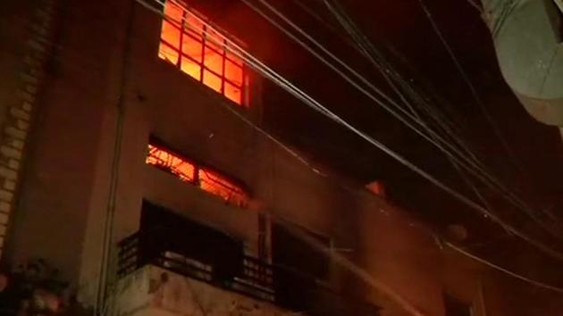 A fire broke out in two garment warehouses on Rama Road in Delhi Sunday night.(ANI/Twitter)