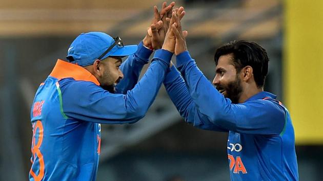 Guwahati: Indian cricket team Captain Virat Kohli celebrates with teammate Ravindra Jadeja during the first One Day International cricket match against West Indies (PTI) Guwahati: Indian cricket team Captain Virat Kohli celebrates with teammate Ravindra Jadeja during the first One Day International cricket match against West Indies (PTI)