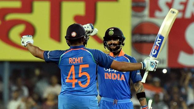 Rohit Sharma celebrates his century with captain Virat kohli (right) in Guwahati on Sunday. (PTI) Rohit Sharma celebrates his century with captain Virat kohli (right) in Guwahati on Sunday. (PTI)