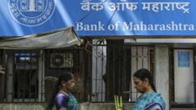 Pedestrians walk past a Bank of Maharashtra Ltd. bank branch in Mumbai, India, on Saturday, Oct. 19, 2013. Photographer: Dhiraj Singh/Bloomberg (Bloomberg) Pedestrians walk past a Bank of Maharashtra Ltd. bank branch in Mumbai, India, on Saturday, Oct. 19, 2013. Photographer: Dhiraj Singh/Bloomberg (Bloomberg)