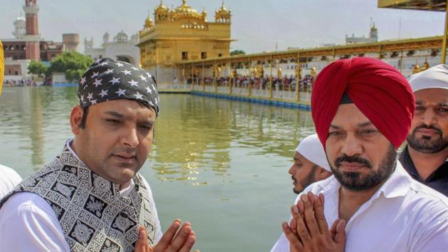 Kapil Sharma and Gurpreet Ghuggi offer prayers at Golden Temple, Amritsar during a promotion for their film Son Of Manjeet Singh on October 6, 2018.(PTI) Kapil Sharma and Gurpreet Ghuggi offer prayers at Golden Temple, Amritsar during a promotion for their film Son Of Manjeet Singh on October 6, 2018.(PTI)
