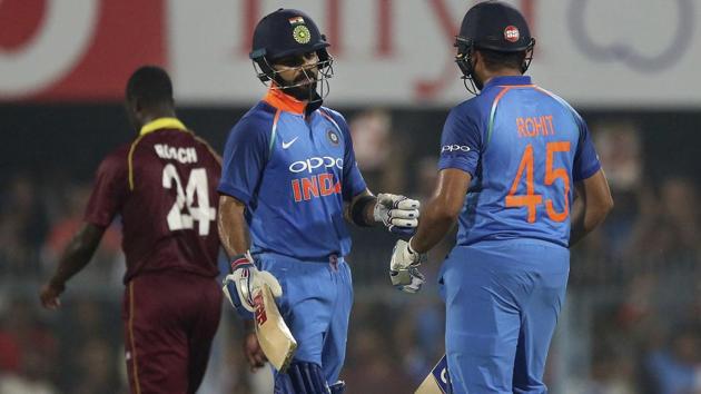 Virat Kohli and Rohit Sharma (45) during their partnership of 246 in Guwahati on Sunday. (AP) Virat Kohli and Rohit Sharma (45) during their partnership of 246 in Guwahati on Sunday. (AP)