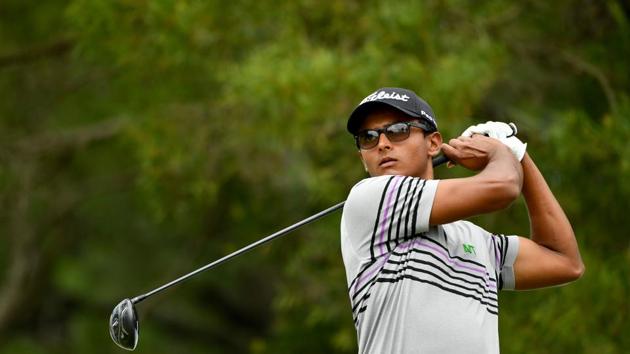 Viraj Madappa hits a shot during round three of the Yeangder Tournament Players Championship at the Linkou International Golf and Country Club.(AFP)