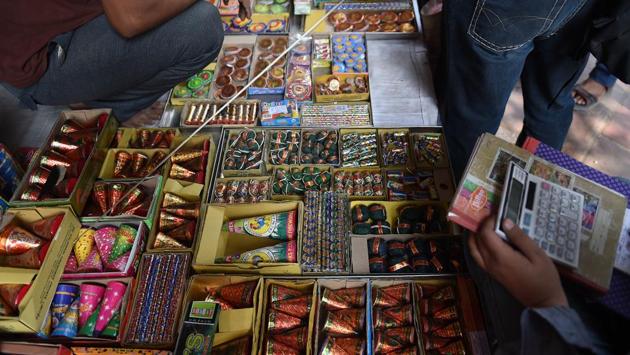 The Supreme Court on Tuesday said that people can burst low-emission firecrackers between 8pm and 10pm this Diwali, ruling against a blanket ban on fireworks. It also stipulated a 35-minute window for new year celebrations setting a time between 11:55pm to 12:30am for bursting crackers. No fire crackers would be burst during the day, it said. (Money Sharma / AFP) 