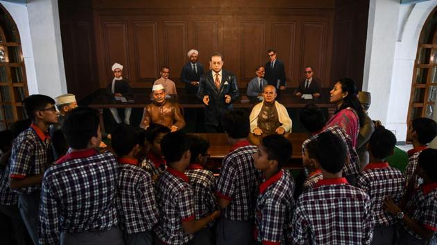 Students listen to a guide explain the ‘making of the constitution of India’ at the museum. “The museum depicts the democratic heritage of India and gives a peek into the lives of former presidents,” education officer Pankaj Protim Bordoloi told AFP. (Chandan Khanna / AFP) 