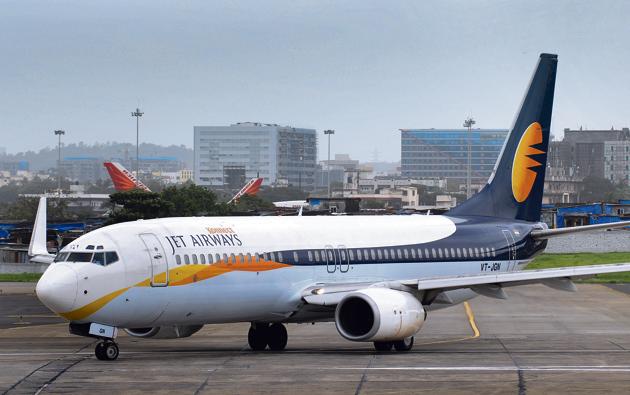 Jet airways aircraft taxis for take off at Mumbai International Airport in Mumbai. (Mint) Jet airways aircraft taxis for take off at Mumbai International Airport in Mumbai. (Mint)