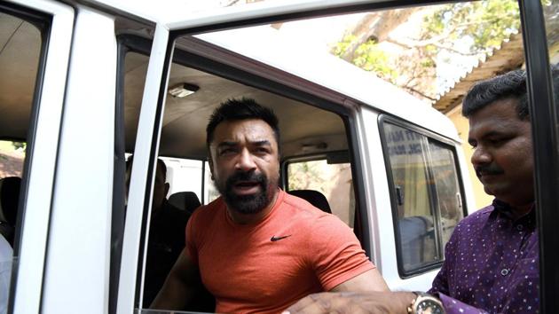 Actor Ajaz Khan in police custody on Tuesday.(BACHCHAN KUMAR/HT PHOTO) Actor Ajaz Khan in police custody on Tuesday.(BACHCHAN KUMAR/HT PHOTO)