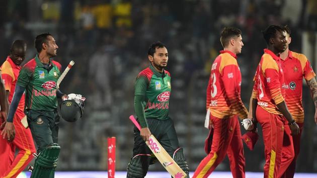 Bangladeshi cricketers Mushfiqur Rahim (2L) and Mohammad Mithun (C) walk off the field after winning the second one day international (ODI) cricket match between Bangladesh and Zimbabwe at the Zahur Ahmed Chowdhury Stadium in Chittagong. (AFP) Bangladeshi cricketers Mushfiqur Rahim (2L) and Mohammad Mithun (C) walk off the field after winning the second one day international (ODI) cricket match between Bangladesh and Zimbabwe at the Zahur Ahmed Chowdhury Stadium in Chittagong. (AFP)