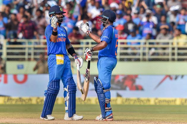 Visakhapatnam: Indian batsmen Virat Kohli and Ambati Rayudu celebrate during the 2nd ODI cricket match against West Indies in Visakhapatnam. (PTI)
