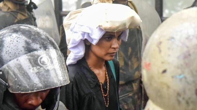 Sabarimala: Activist Rehana Fathima being escorted by the police to Sabarimala Temple, Kerala, Friday, Oct 19, 2018. Rehana Fathima and journalist Kavitha Jakkal were taken to the temple but the priest, reportedly, locked it and the women had to return mid-way. (PTI Photo) (PTI10_19_2018_000014B)(PTI file photo+)