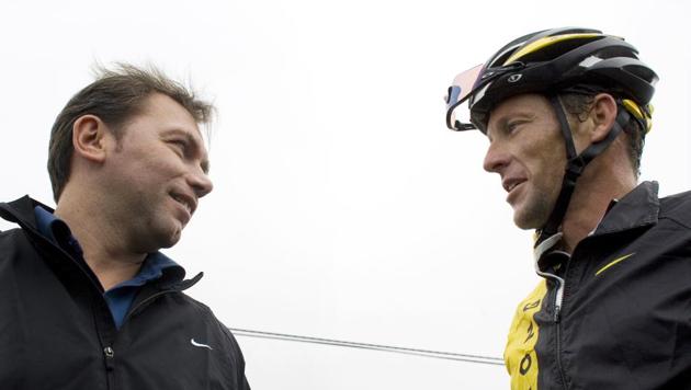 File image of Lance Armstrong (right) speaking to Astana team director Johan Bruyneel. (AP) File image of Lance Armstrong (right) speaking to Astana team director Johan Bruyneel. (AP)