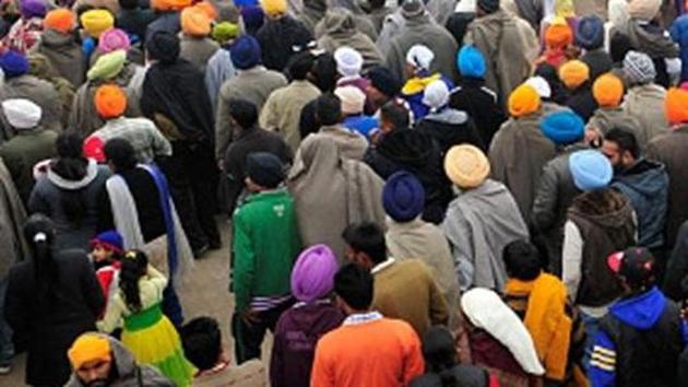 Sikh community members in Pakistan has been exempted from wearing helmets while riding motorcycles in Peshawar.(HT Photo)