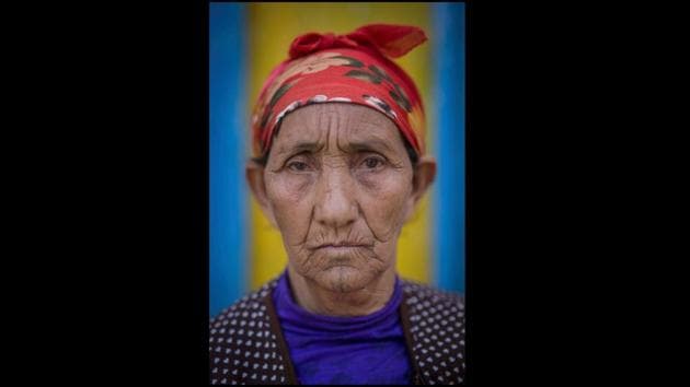 Portrait of 60-year-old Hadda Saghir. At the height of their popularity, the tattoos were seen as having the power to drive away bad spirits and bring good fortune. Some accounts said that during French colonial rule, some indigenous women believed their marked faces would make them undesirable to foreign men. However, the claim is widely disputed since the tattoos predate the colonisation of Morocco. (Mosa'ab Elshamy / AP)