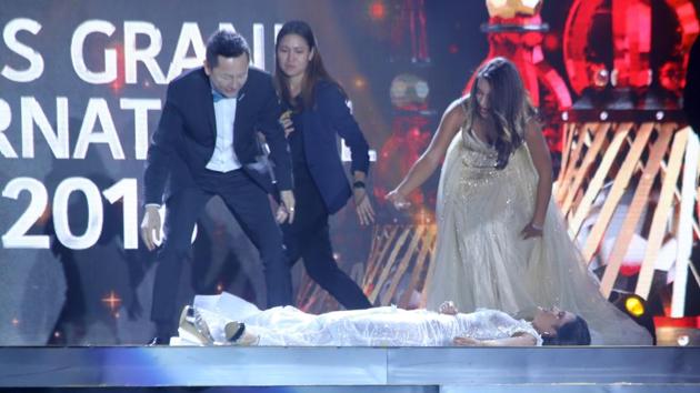 Miss Paraguay Clara Sosa lies on stage after she fainted following the announcement that she won as Miss Grand International.(AP) Miss Paraguay Clara Sosa lies on stage after she fainted following the announcement that she won as Miss Grand International.(AP)