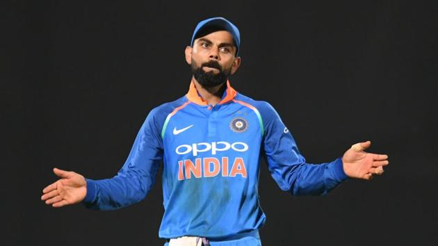 Indian cricket team captain Virat Kohli gestures towards the stands during the second one day international (ODI) cricket match between India and West Indies (AFP) Indian cricket team captain Virat Kohli gestures towards the stands during the second one day international (ODI) cricket match between India and West Indies (AFP)
